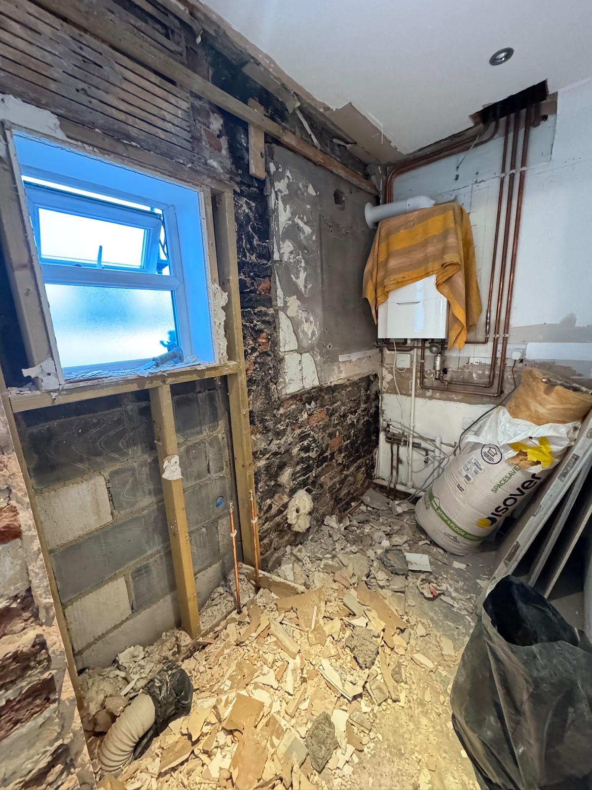 During: taken back to the original brickwork