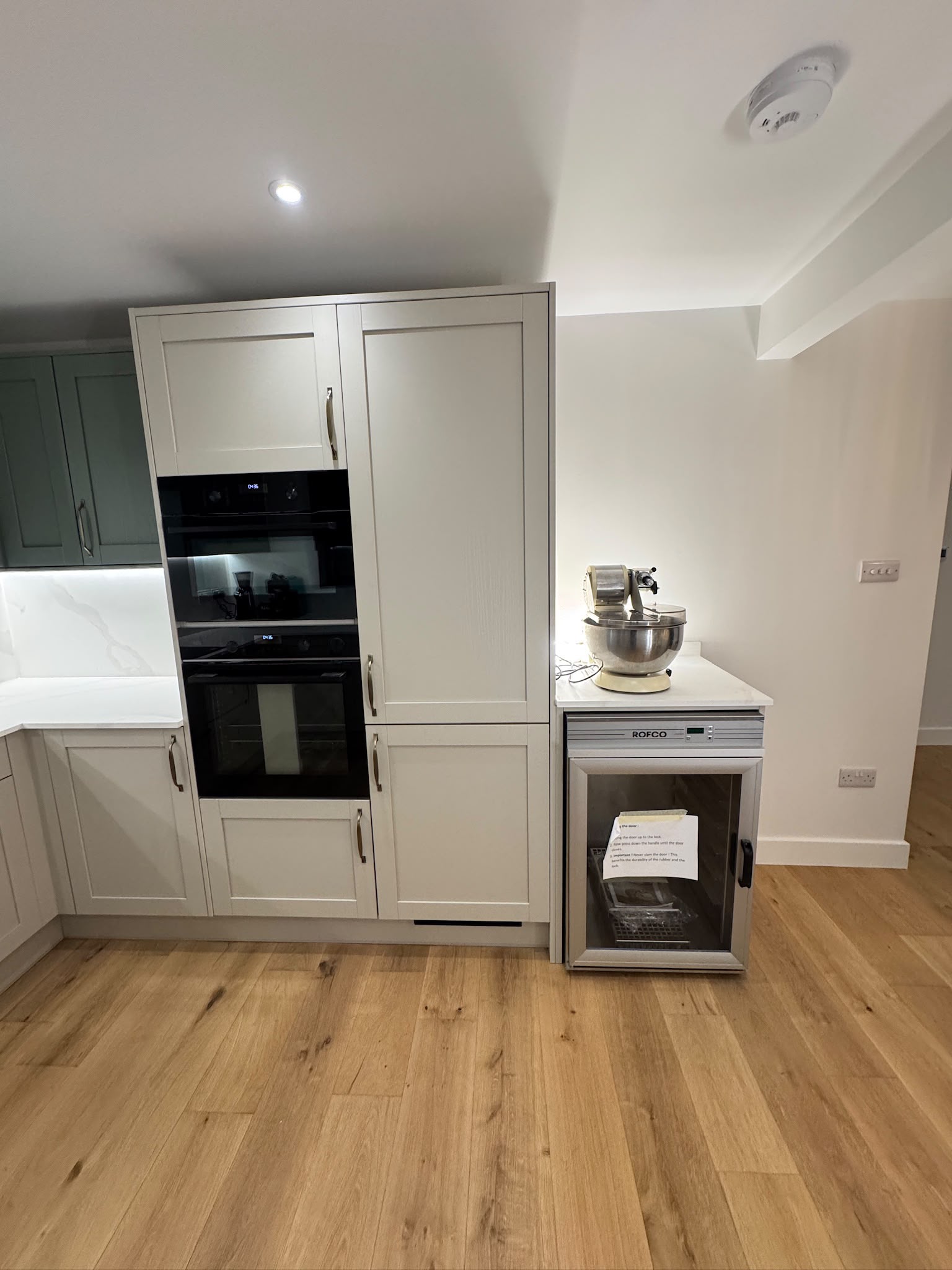 Tall units housing two commercial-style ovens