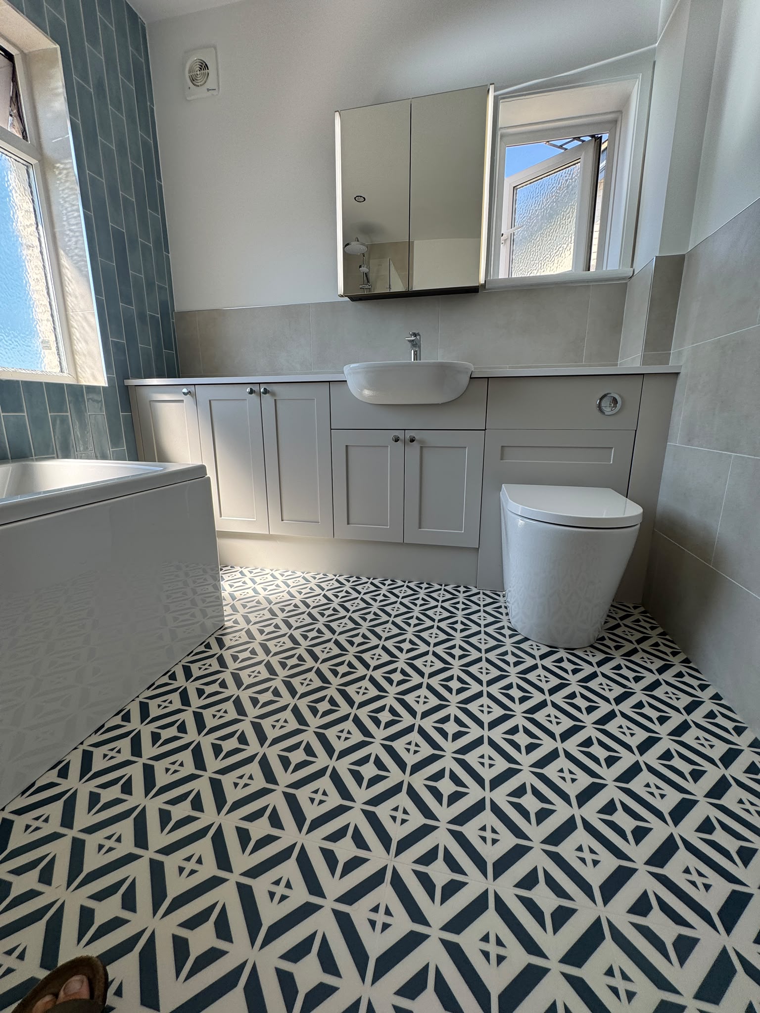 Storage units and WC on the patterned floor