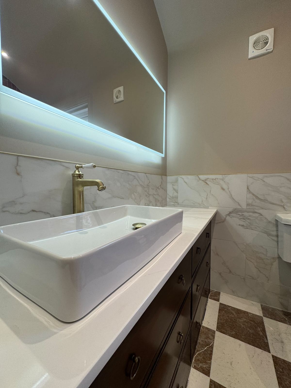 Countertop basin and brass tap detail