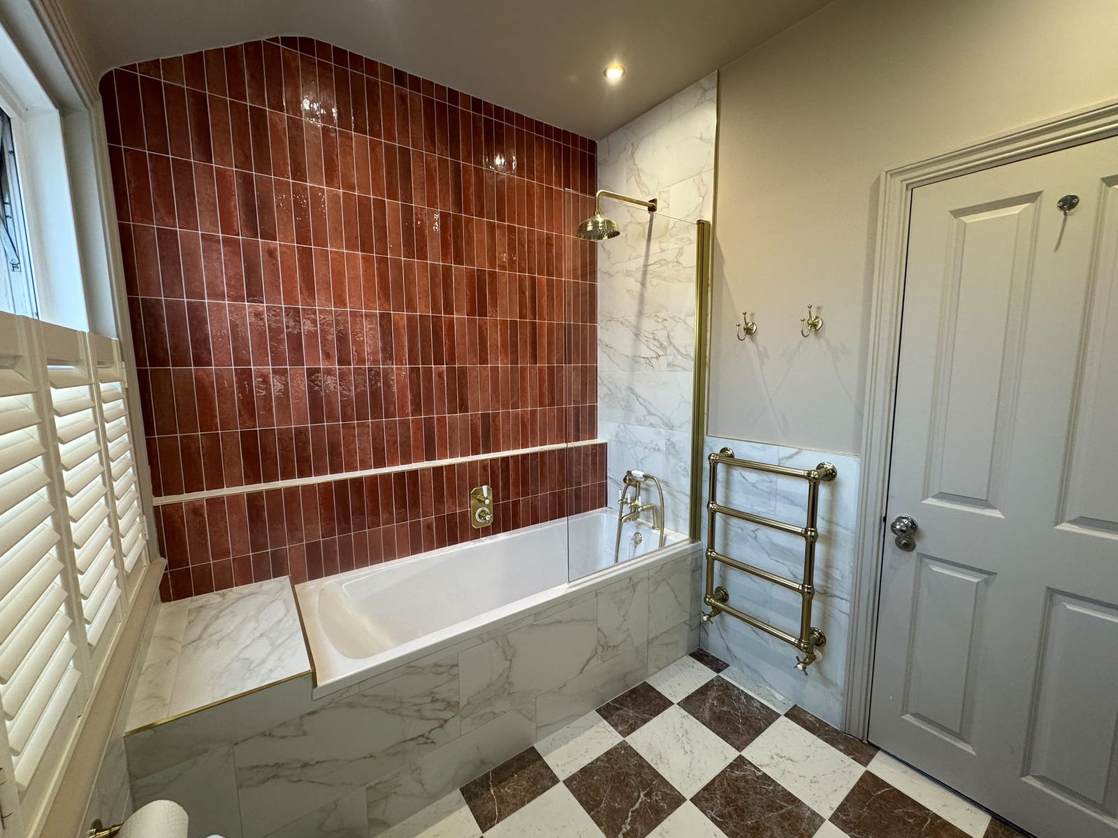 Queen Street bathroom: terracotta tiles, marble and a chequered floor