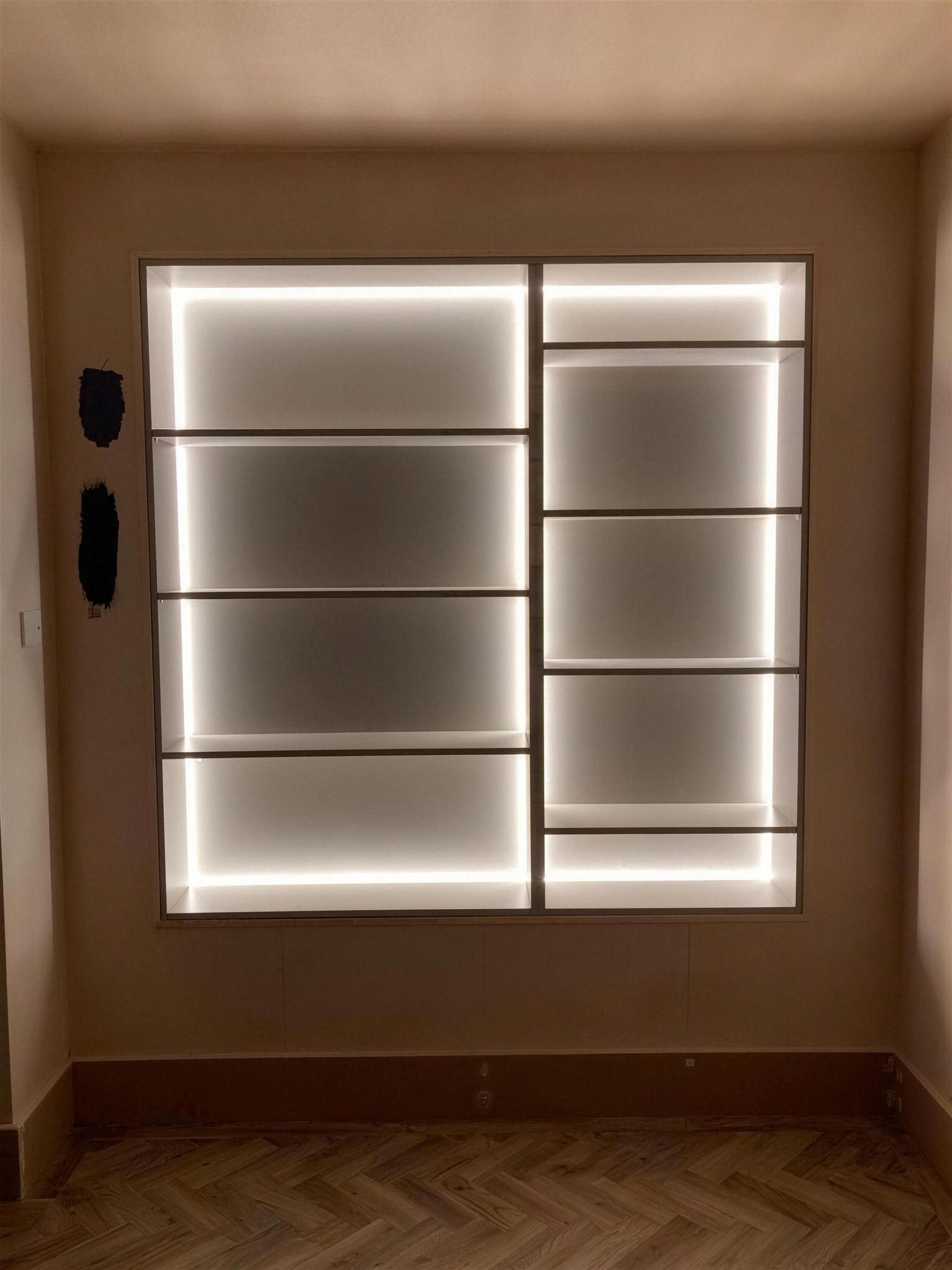 Bespoke fitted shelving unit with integrated LED lighting